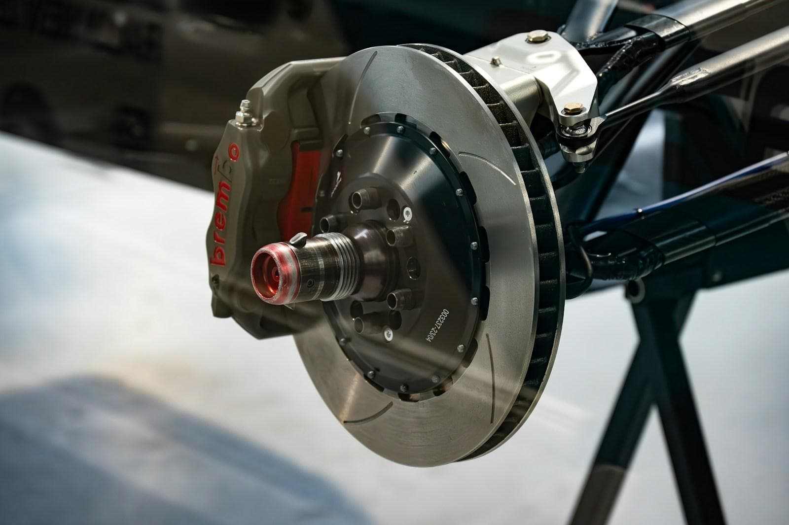 Brake disc and caliper assembly mounted for inspection